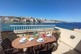 Blue Harbour Seafront Penthouse With Large Terrace With Panoramic Sea Views - By Getawaysmalta