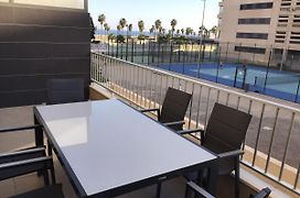 Apartamento Lujo, Primera linea playa, Garaje, Wifi, Piscina climatizada
